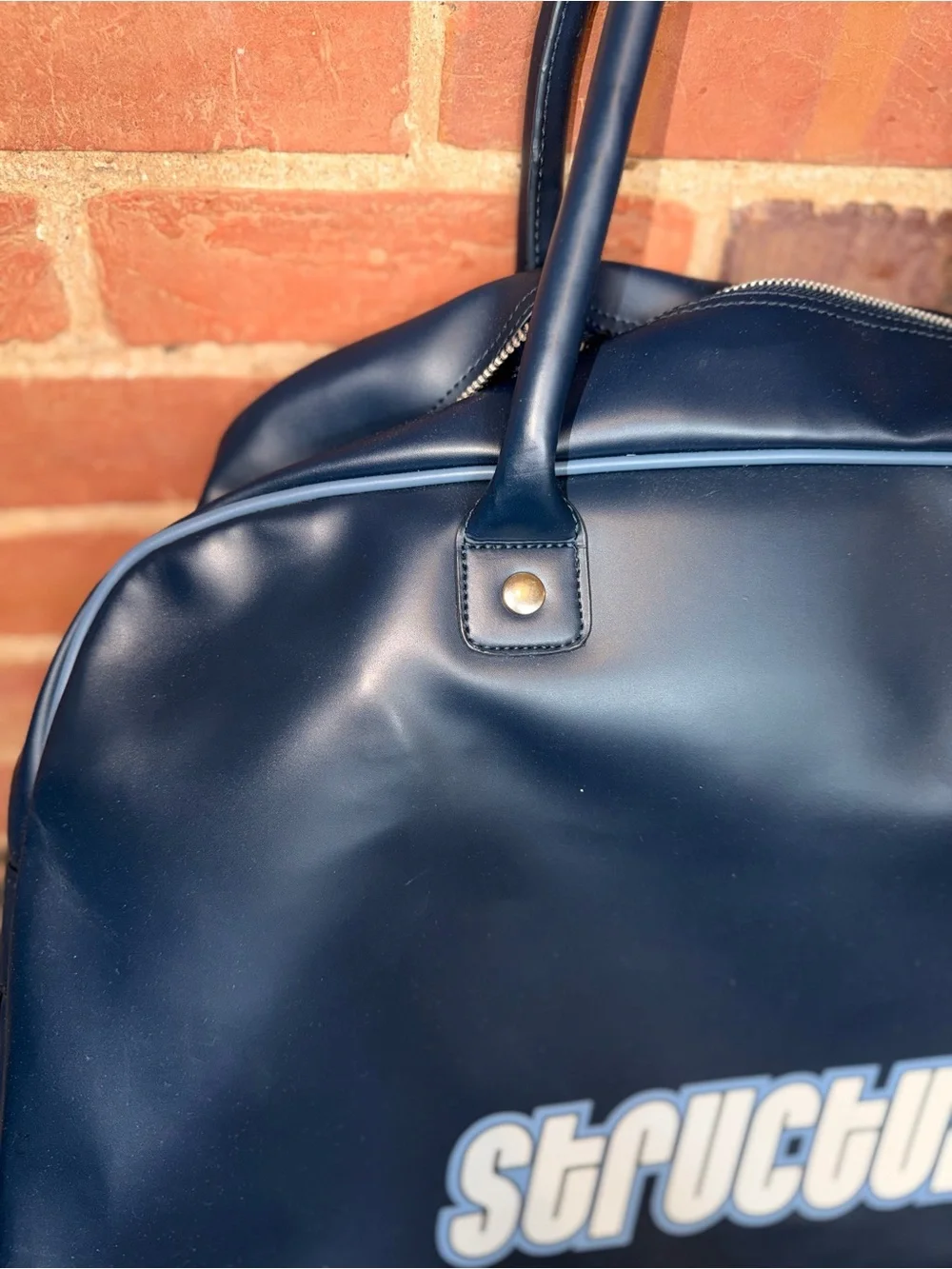 Structure Navy Duffel with White Logo and Adjustable Strap